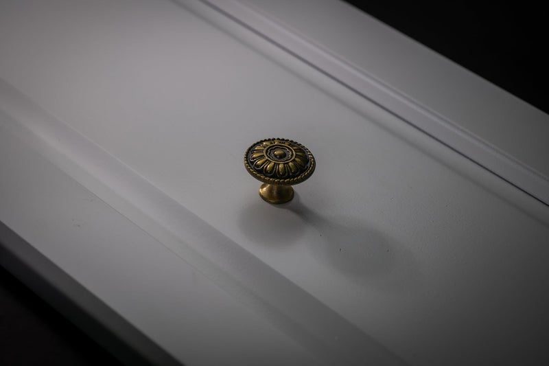 trust4care 4-Pack Euro Style Brushed Antique Brass Kitchen Cabinet Knobs, Zinc Alloy Vintage Drawer Knobs, Weathered Gold Round Dresser Handles with Floral for Bathroom & Furniture, 1.25" Diameter - Image 3